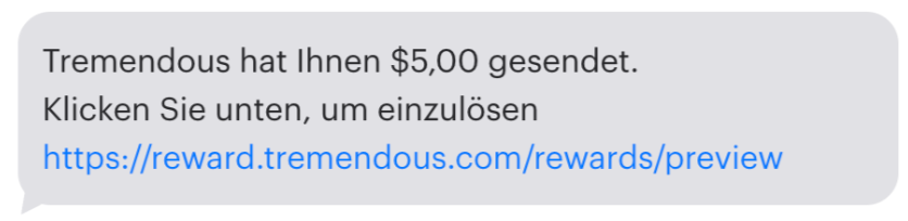Beispiel einer SMS von Tremendous über +1 (205) 740-2170.