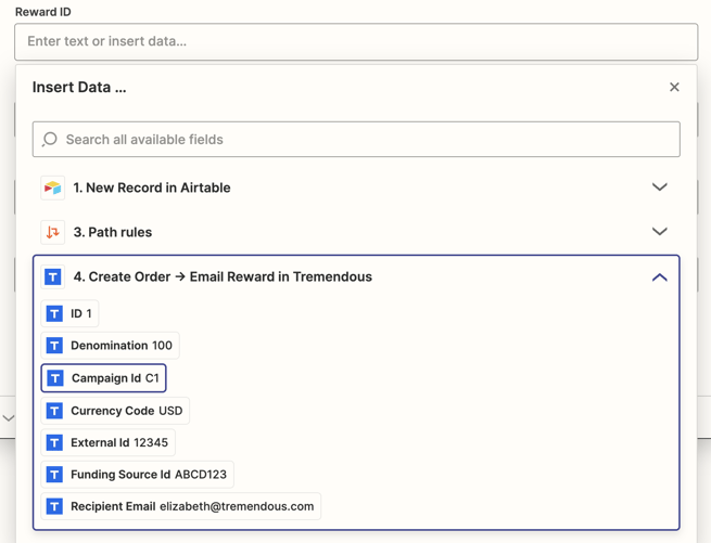 To update Airtable fields using the Zapier integration, a Tremendous field titled "Reward ID" has been selected.